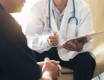 Doctor providing patient care to someone who suffered personal injury.